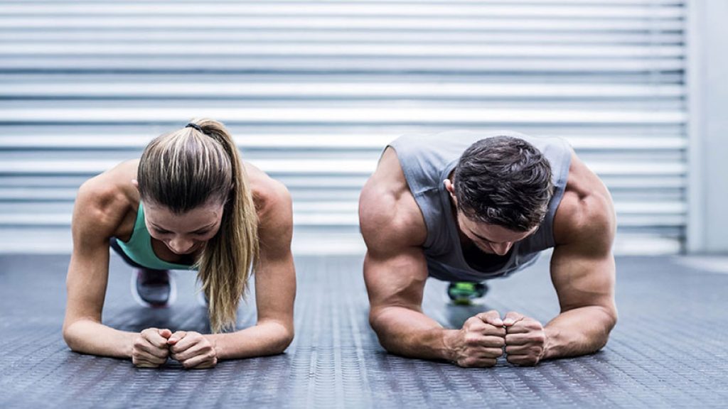 a girl and a man in training