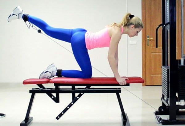 standing cable hip extension with bench